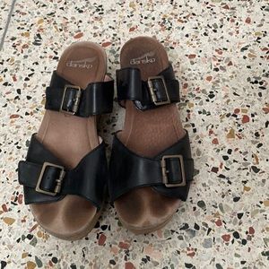 Dansko black leather wedges